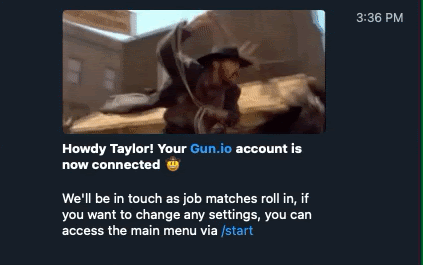 Screenshot of and example of Gun.io's Telegram bot welcome message, featuring an animated GIF of a cowboy swinging a lasso